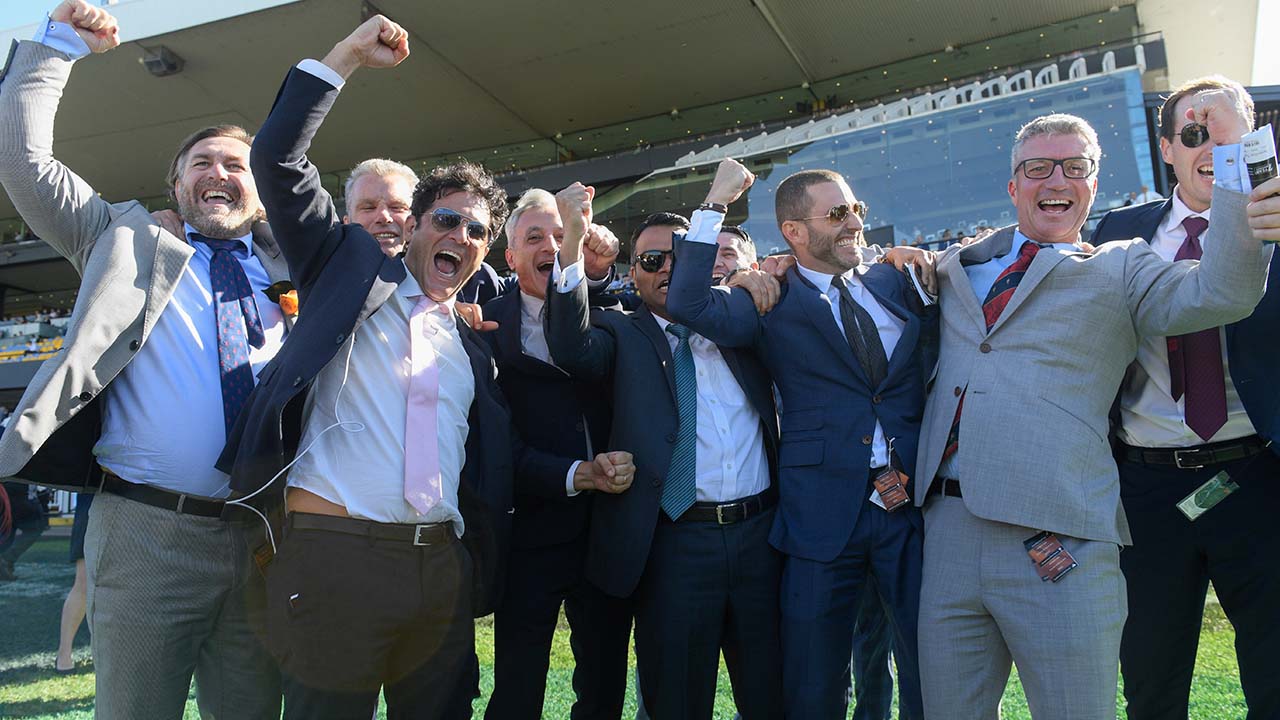 The Racing League owners celebrating